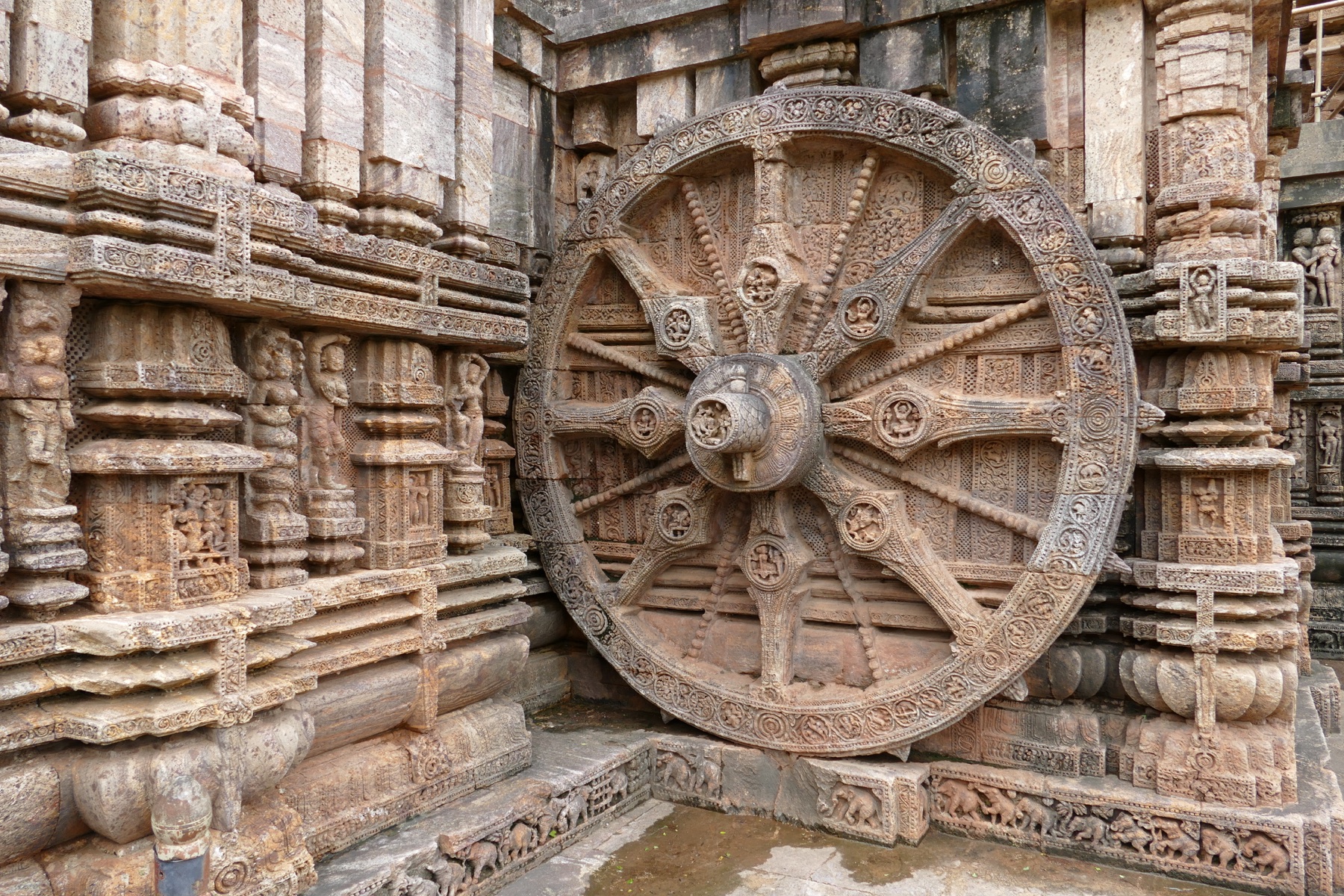 The intricately carved stone wheel of the Konark Sun Temple in Odisha